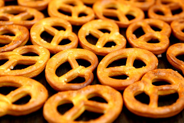 salted crispy fresh pretzels lie on the table
