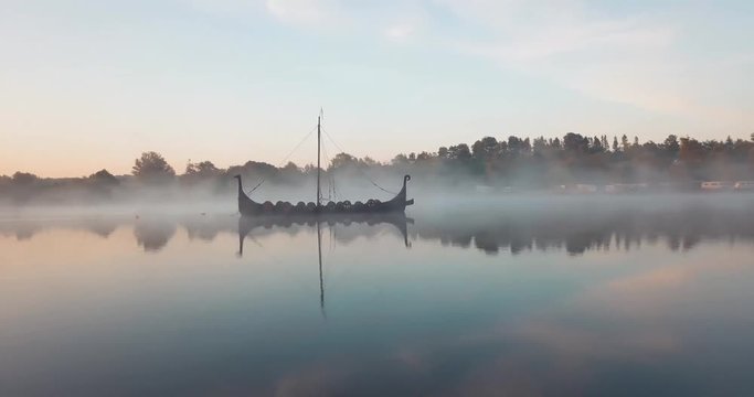 Viking ship placed in the middle of a lake, around Vejle, Denmark. Recorded at 4am in the morning.