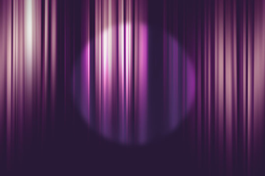 spotlight on purple movie theater curtains background