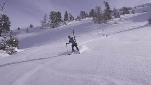 120fps slow motion video of skier falling while doing a trick.