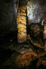 Postojna cave, Slovenia. Formations inside cave with stalactites and stalagmites.