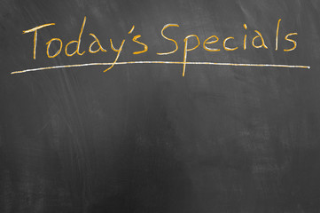 Today specials title chalk text on blackboard .