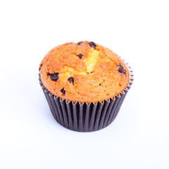 Fresh homemade cake and muffin on Sackcloth woven texture background. Selective focus.