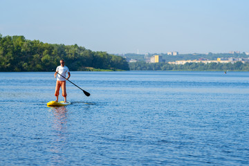 Man paddling on a SUP board