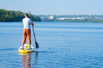 Man paddling on a SUP board