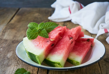 Slices of ripe watermelon in a bowl   