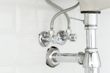 Water pipe under sink on White background