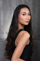 Asian Long straight black hair tan skin woman in Black dress