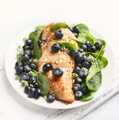 Fresh salad with blueberries and chicken