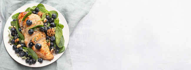 Fresh salad with blueberries and chicken