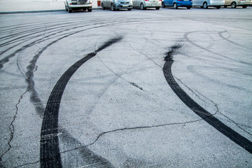 burnt rubber traces on asphalt