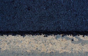 Process of building new asphalt road on the new road construction site in Thailand