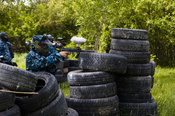 guy shootig in paintball