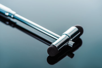 selective focus of reflex hammer on glass surface