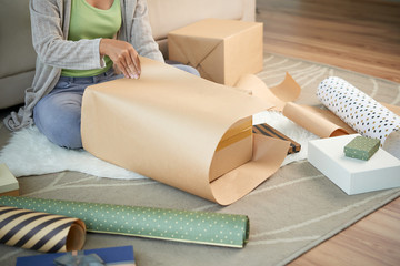 Woman wrapping presents