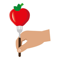 hand with apple in fork