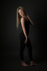 Fototapeta na wymiar Blonde young woman dancing dancehall