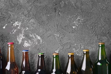 Crédence de cuisine  Bottles of beer on textured background  © Pixel-Shot