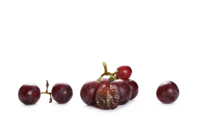 Cardinal grapes with halved slice isolated on white background