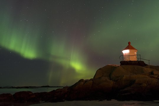 Northern Lights Over A Lighthouse, Eggum, Vestvagoy, District Of Lofoten, Norway, Europe