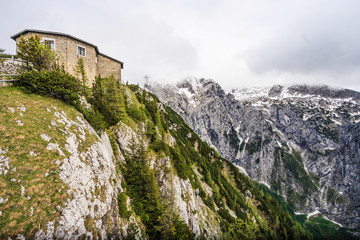Fototapeta na wymiar Kehlsteinhaus, the Eagle Nest, atop the summit of the Kehlstein, a rocky outcrop that rises above the Obersalzberg near the town of Berchtesgaden in Germany, Europe