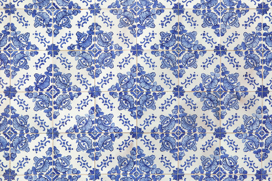 Traditional Portuguese azulejo tiles on the building in Porto, Portugal.