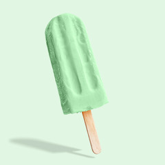 Fruit ice cream on a stick. Bright color, summer mood.