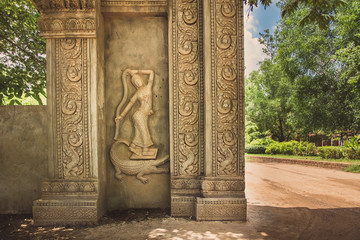 Detail of reliefs on the stone in Buddhist temple