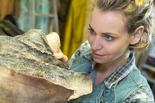 woman working with dry fish