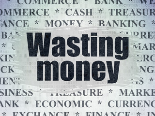 Banking concept: Painted black text Wasting Money on Digital Data Paper background with   Tag Cloud