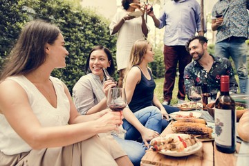 Group of diverse friends enjoying summer party together