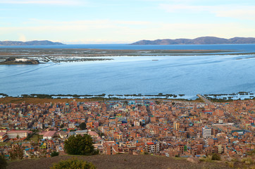 Lake Titicaca, the Highest Navigable Lake in the World and the City of Puno as Seen from the Condor...