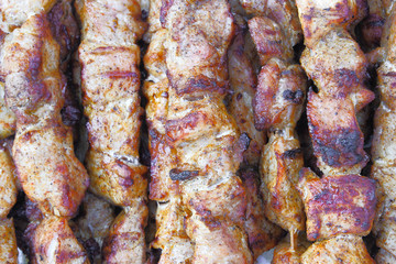 Barbecue meat on wooden skewers on the grill top View, flat layout