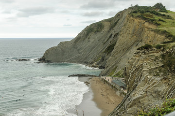 cliffs with flysch stratotypes on the beach of itzurun in Zumaia in the Basque Country, in the north of Spain.