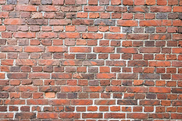 Old worn brick wall exterior pattern texture background