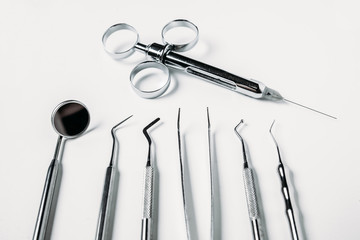 dental and endodontic restoration instruments on a white background. Top view