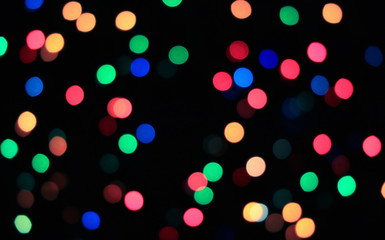 Multi-color Polka Dots Bokeh Lights on Dark Background 