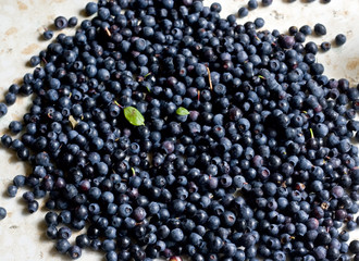 A lot of blueberries lie on the table