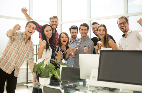 young business team is unpacking boxes in a new office