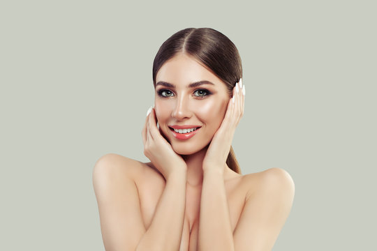 Smiling Woman Spa Model with Healthy Skin and Straight Hair. Facial Treatment, Cosmetology, Beauty, Skin Care and Spa