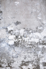 Damaged grey concrete wall exterior background texture