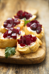 Homemade cream cheese and beetroot crostini
