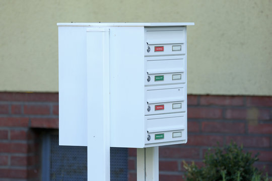 white letter box near the house in Germany