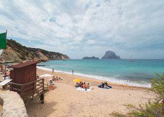 Fototapeta na wymiar Cala D'hort beach, in Ibiza, Spain, on a stormy spring-summer day