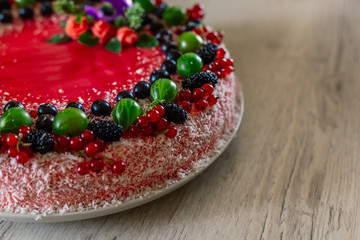 Delicious healthy vegetarian food, do not bake a strawberry cheesecake, decorated with fresh red berries and green mint leaves. Copy space