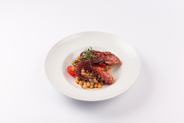 Top and front view - Salad with naut and octopus, tomatoes, aromatic herbs.