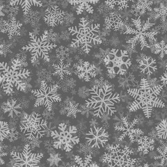 Naklejka na ściany i meble Christmas seamless pattern of many layers of snowflakes of different shapes, sizes and transparency. White on gray background