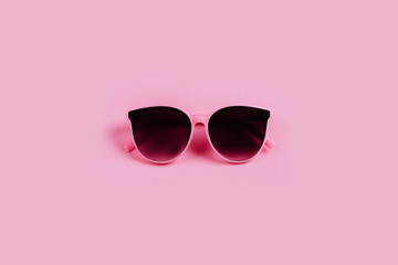 sunglasses isolated on a pink background