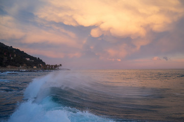 Stormy clouds of contrasting color over sea