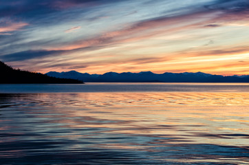 Beautiful sunset above the sea and mountain